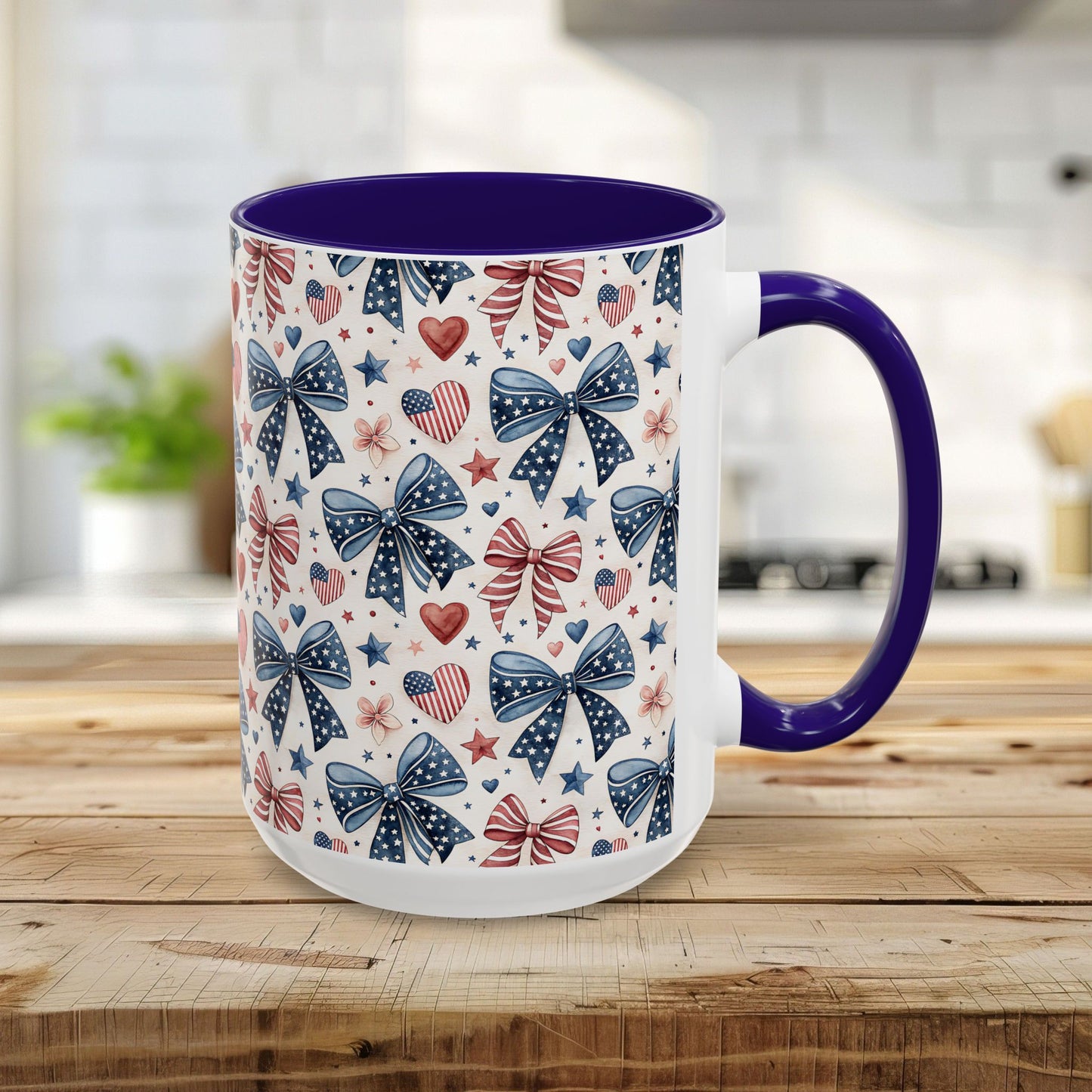 15oz ceramic mug with patriotic bows, hearts, and stars pattern; blue interior and handle.