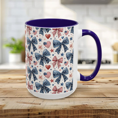 15oz ceramic mug with patriotic bows, hearts, and stars pattern; blue interior and handle.