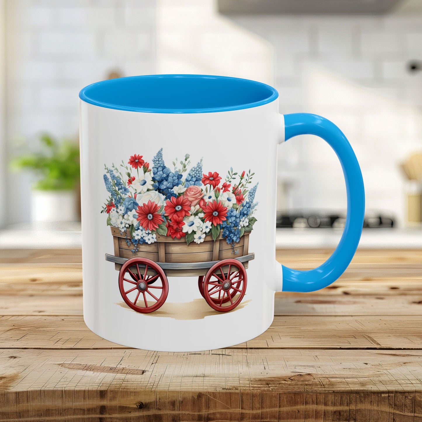 11oz ceramic mug with light blue handle/interior and a vintage wagon overflowing with patriotic red, white, and blue florals.