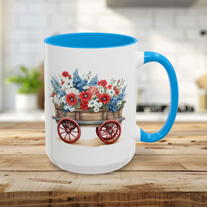 15oz ceramic mug with light blue handle/interior, featuring a vintage wagon with red, white, and blue florals.