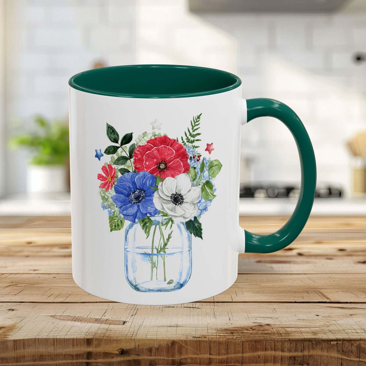 White ceramic mug with green interior and handle, featuring a watercolor patriotic floral mason jar design.