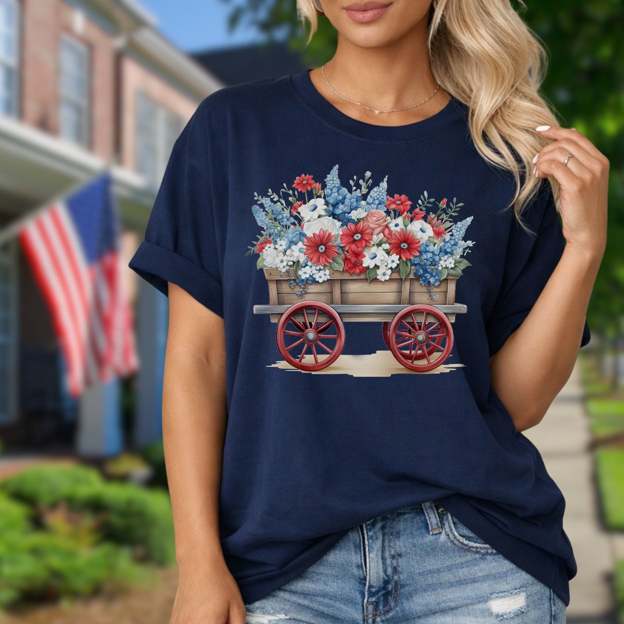 Navy garment-dyed cotton t-shirt with a hand-painted wagon overflowing with red, white, and blue florals.