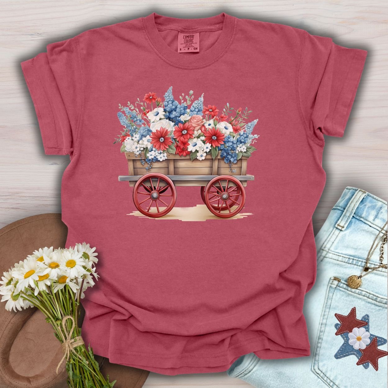 Crimson S t-shirt with a patriotic flower wagon design, made from garment-dyed ring-spun cotton.