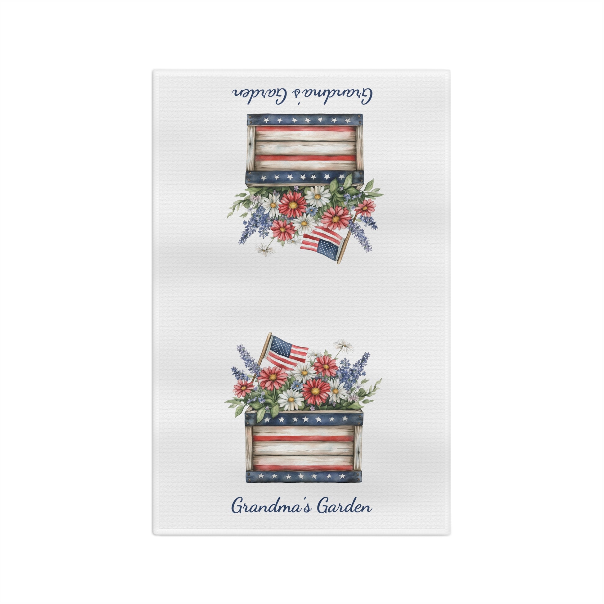 Patriotic microfiber tea towel with two vintage wooden crates in American flag colors, overflowing with daisies, wildflowers, and small flags. "Grandma's Garden" script frames the design.