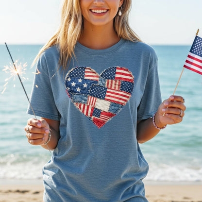 Garment-dyed blue t-shirt with a printed patchwork American flag heart design.