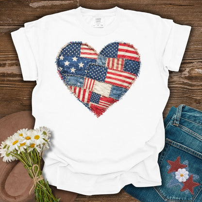 White S t-shirt with a printed distressed faux quilt heart of American flag patches.