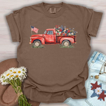 Espresso t-shirt with a watercolor red pickup truck, wildflowers, and an American flag in the bed.
