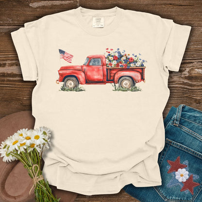 Ivory S t-shirt with a watercolor red pickup truck, wildflowers, and an American flag.