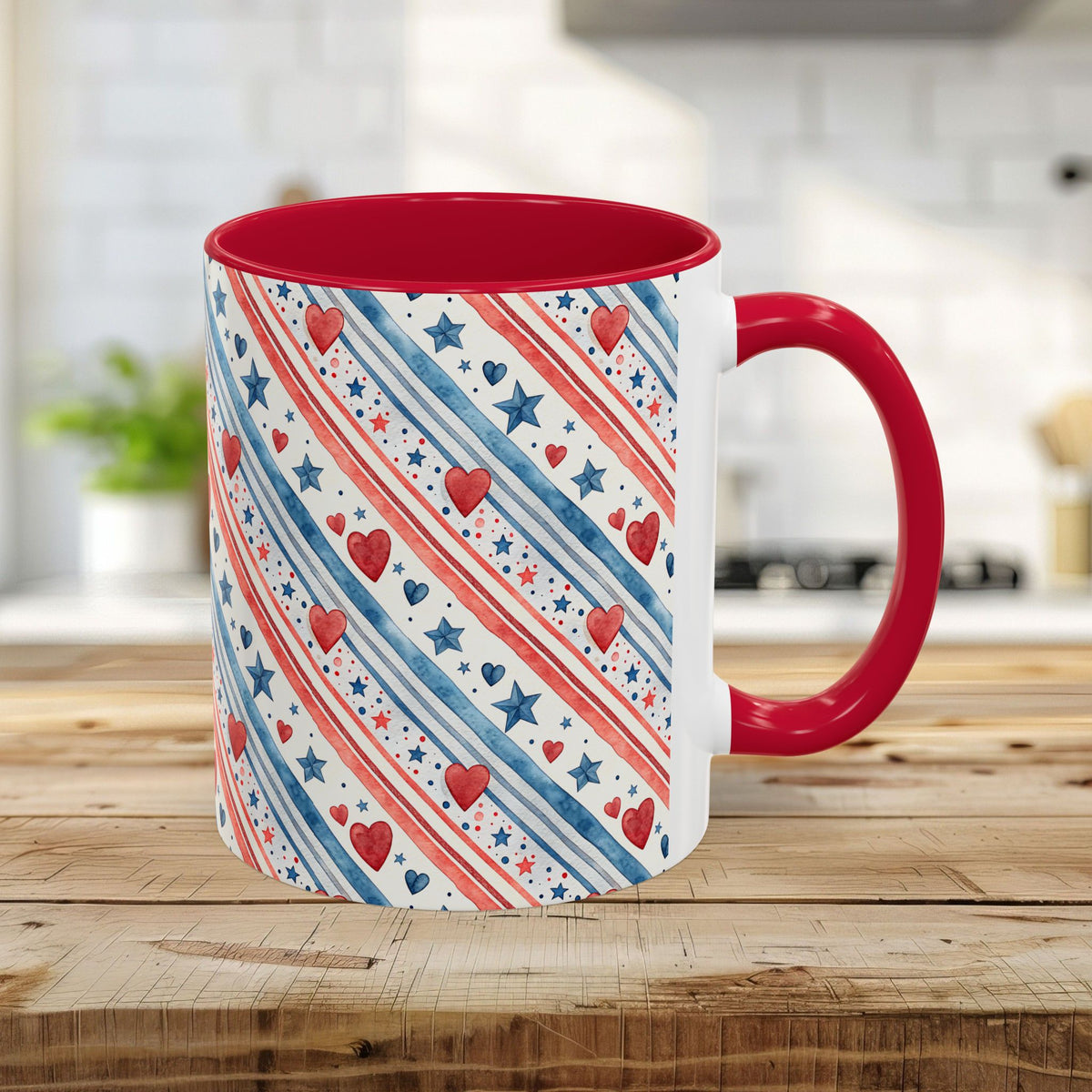 11oz ceramic mug with red interior/handle, patriotic watercolor hearts, stars, and stripes design.