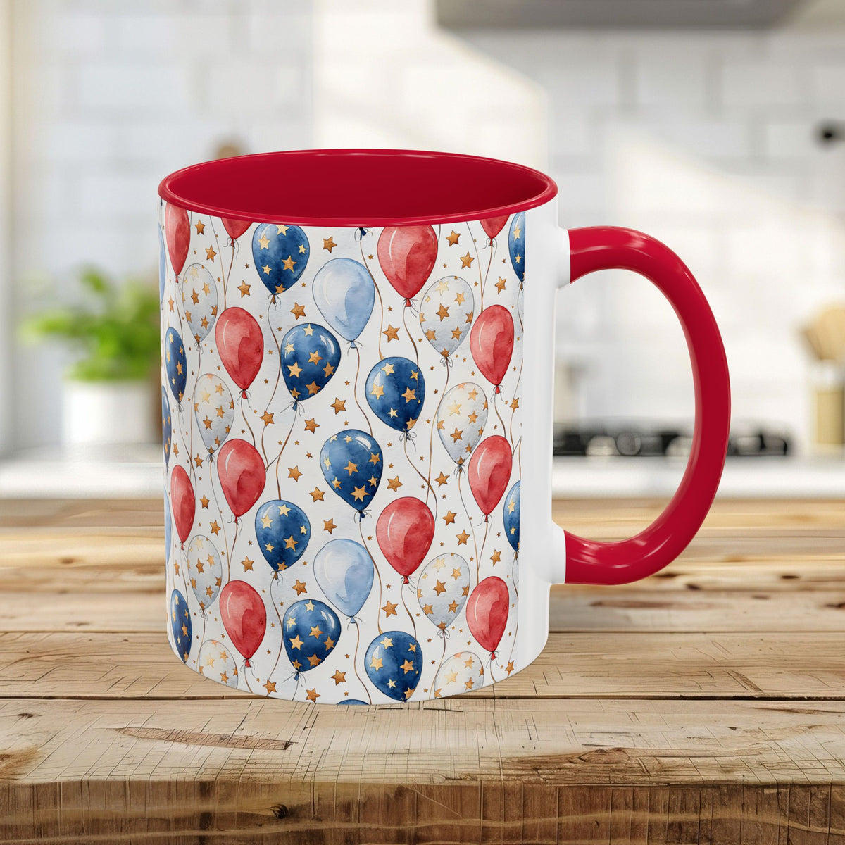 11oz ceramic mug with a red interior/handle and a watercolor red, white, and blue balloon pattern.
