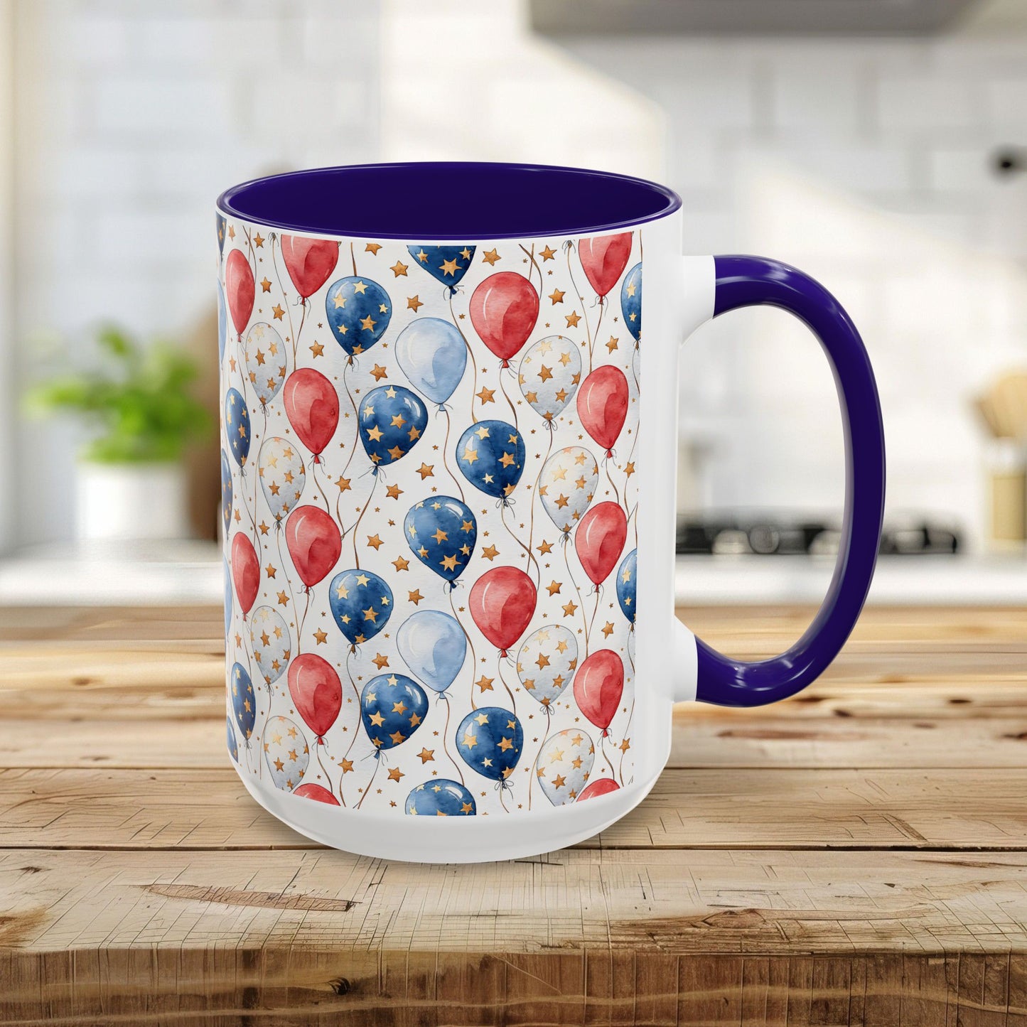 15oz white ceramic mug with blue interior/handle, featuring a watercolor red, white, and blue balloon print.