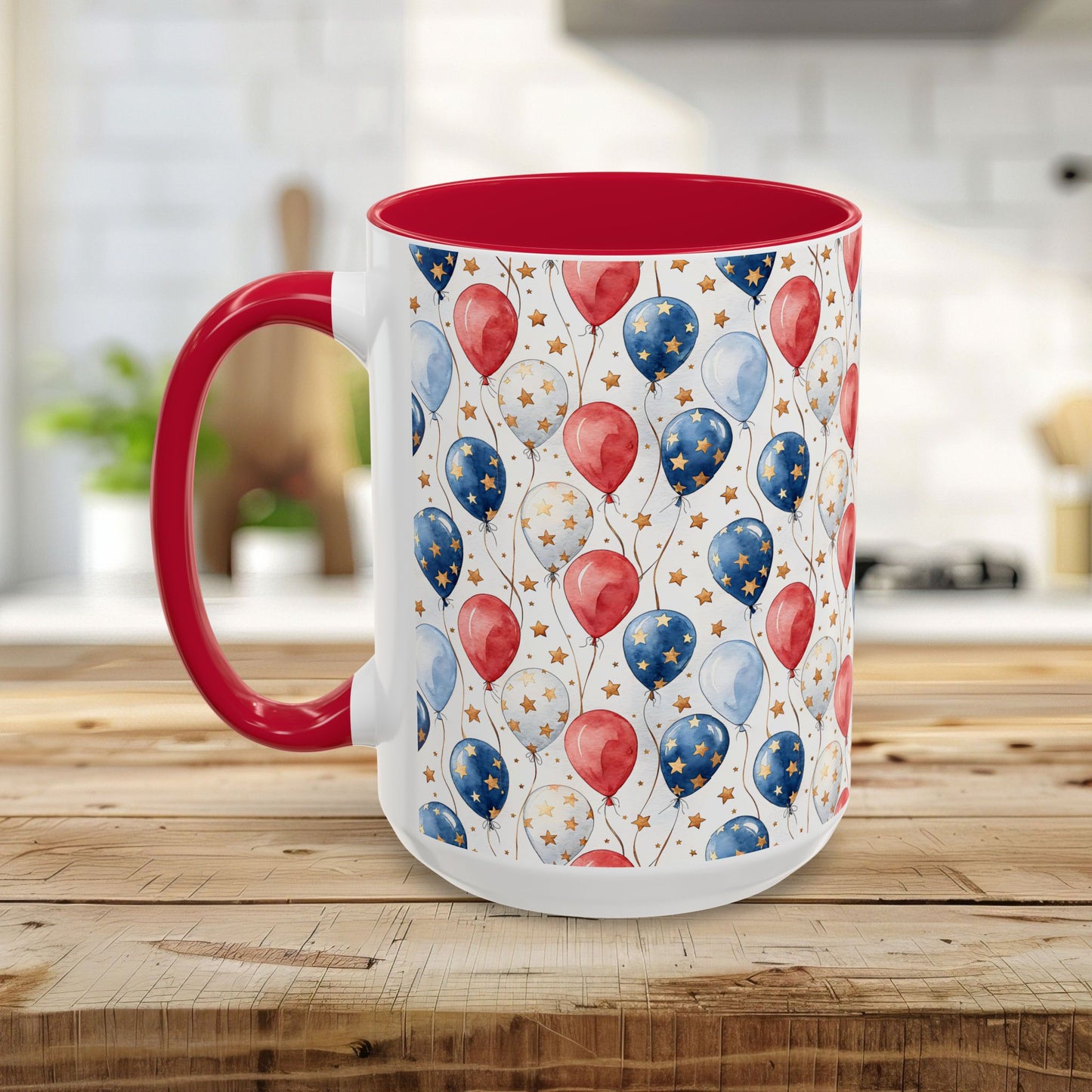 15oz white ceramic mug with red interior/handle, featuring a watercolor red, white, and blue balloon print.