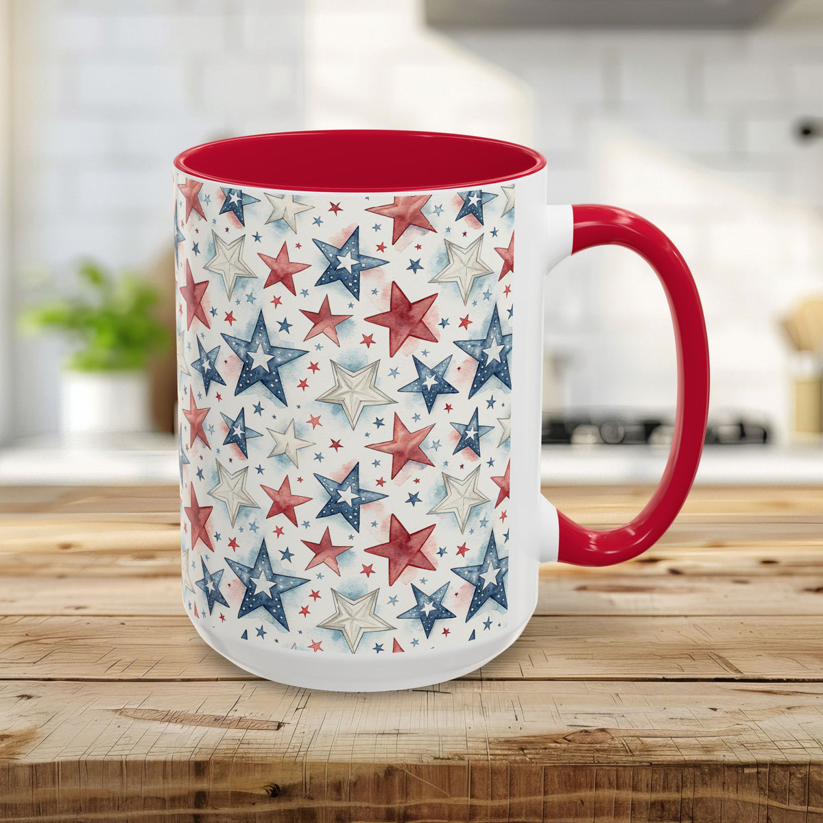 15oz ceramic mug with red interior/handle and a vibrant red, white, and blue watercolor star print.