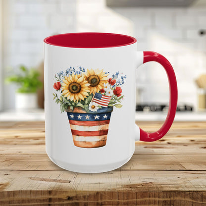 15oz white ceramic mug with red interior/handle, featuring a patriotic sunflower bouquet in an Americana-striped pot.