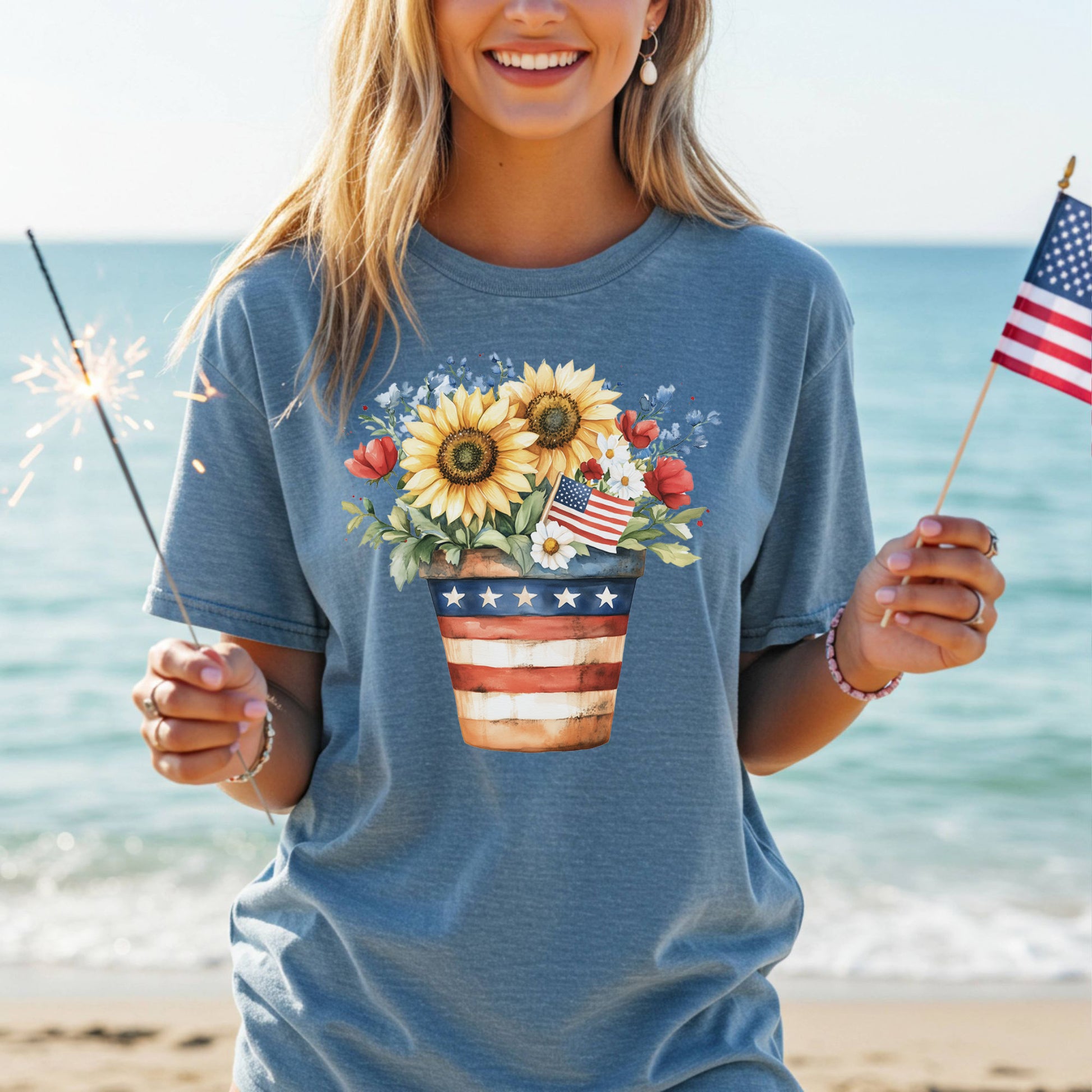 Garment-dyed blue t-shirt with a patriotic sunflower bouquet in an American flag pot design.
