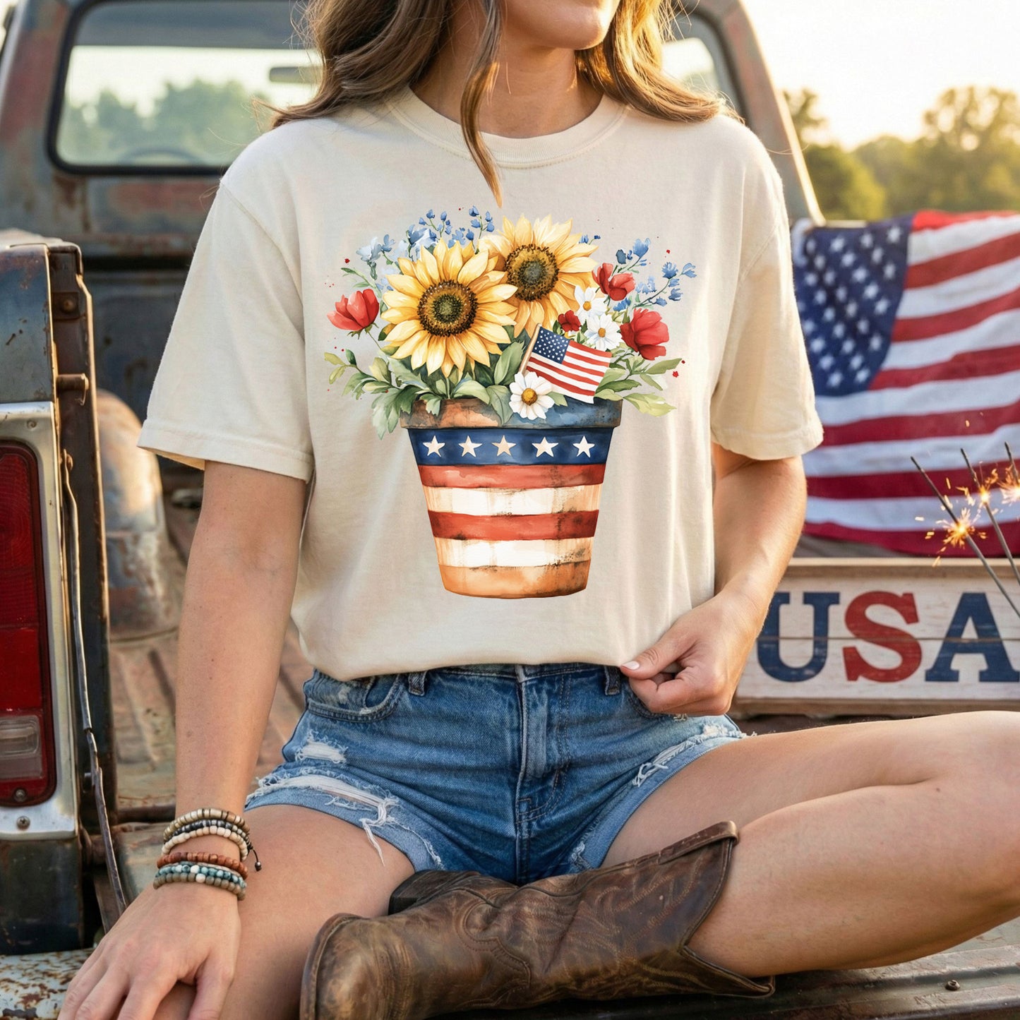 Patriotic sunflower bouquet in an American flag pot on a relaxed-fit, garment-dyed t-shirt.