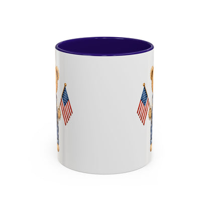 White ceramic mug with a purple interior, featuring a watercolor teddy bear in star-spangled overalls holding an American flag.