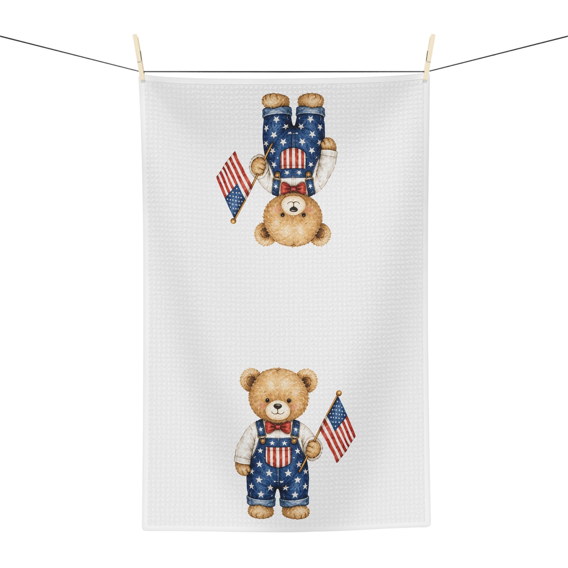 White microfiber tea towel with two watercolor teddy bears in star-spangled overalls holding American flags.