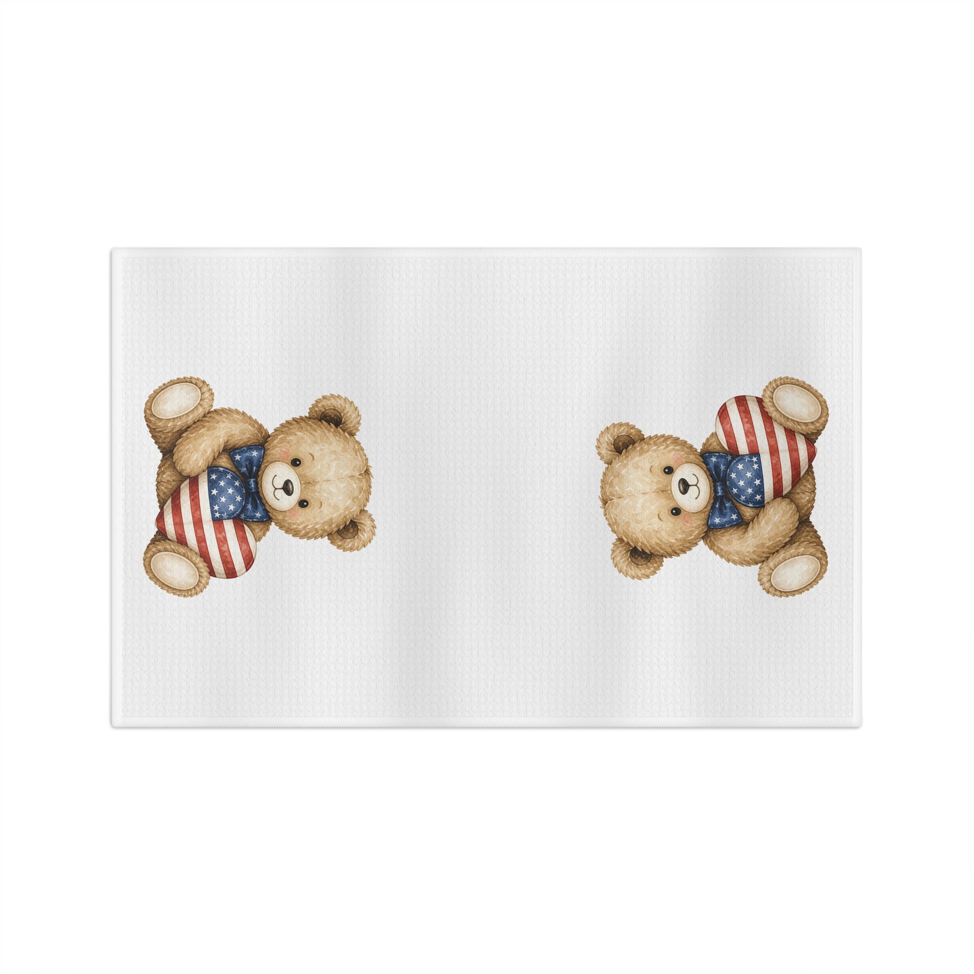 White microfiber tea towel with two watercolor teddy bears holding American flag hearts.