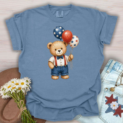 Blue Jean S t-shirt with a vintage teddy bear holding red, white, and blue star balloons.