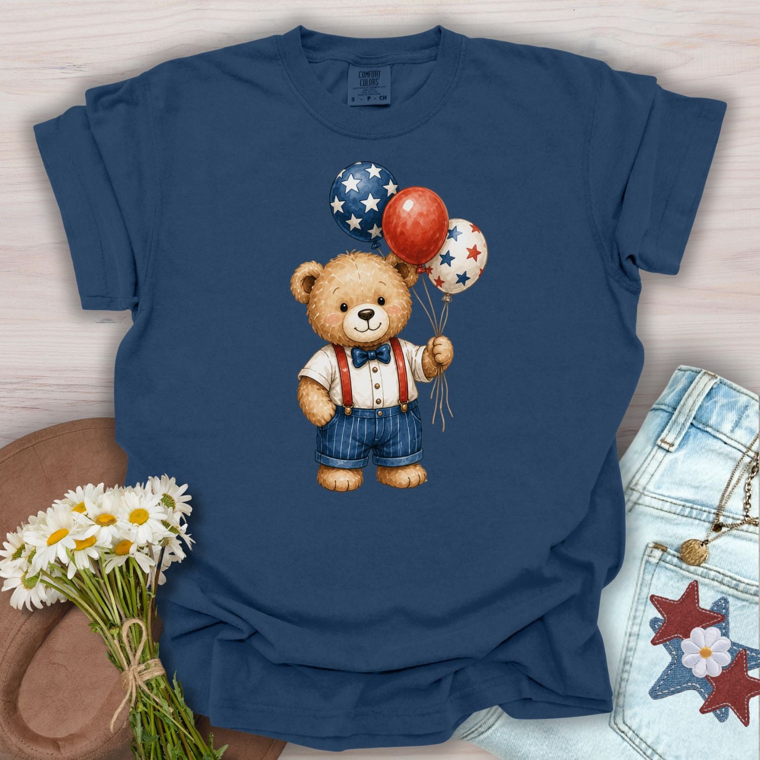 True Navy S-size cotton t-shirt with a vintage teddy bear holding red, white, and blue star balloons.