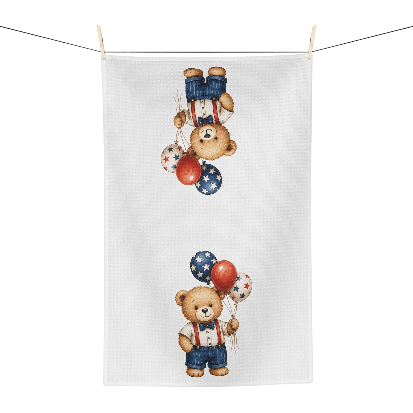 White microfiber tea towel with a vintage-style teddy bear holding red, white, and blue star balloons.