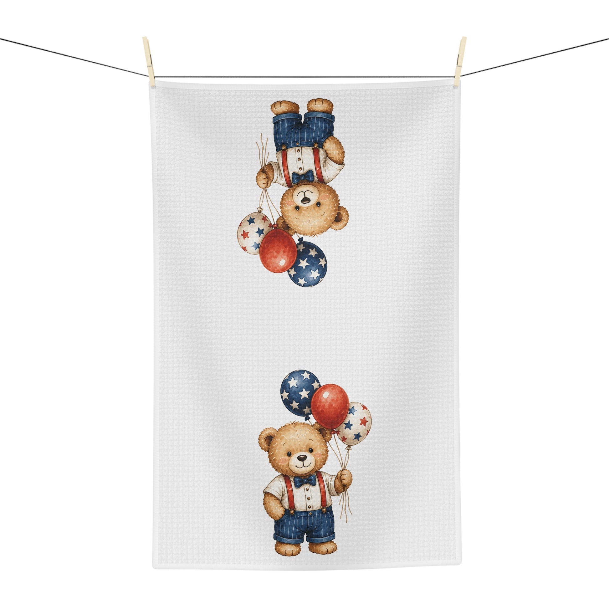 White microfiber tea towel with a vintage-style teddy bear holding red, white, and blue star balloons.