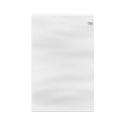White microfiber tea towel with a subtle waffle texture and a sewn-in care label.