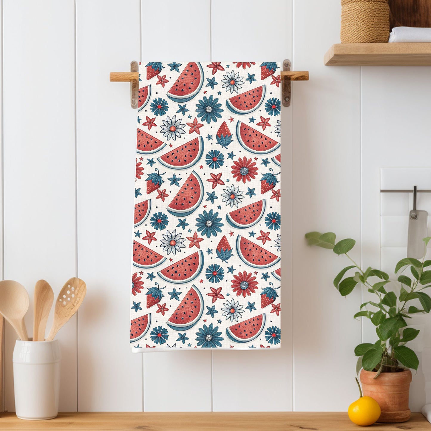 Patriotic microfiber tea towel with watercolor watermelon, floral, and star pattern on a white background.