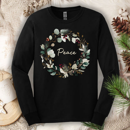 Black Gildan long sleeve tee with a watercolor "Peace" Christmas wreath design.