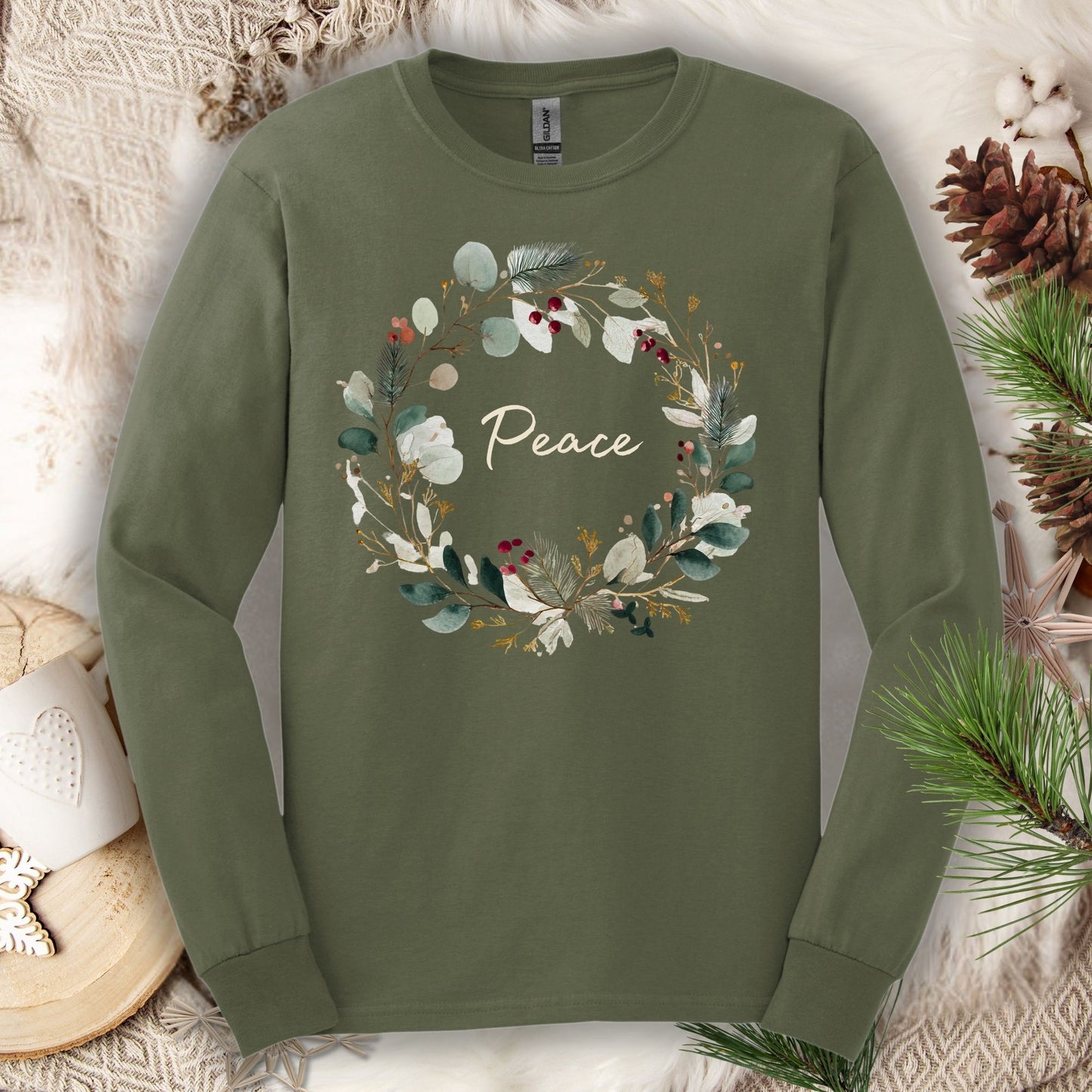 Military Green long sleeve tee with a watercolor "Peace" Christmas wreath design.