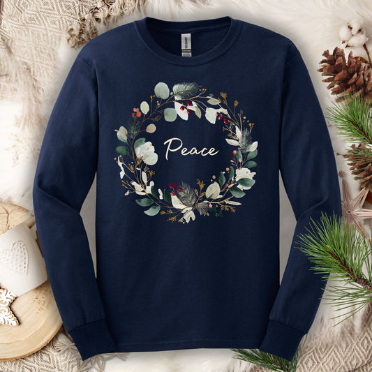 Navy long sleeve tee with a watercolor "Peace" Christmas wreath design.