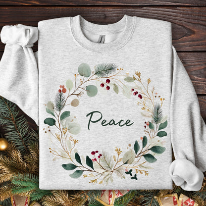 Ash heavyweight cotton sweatshirt with watercolor Christmas wreath and "Peace" in green.