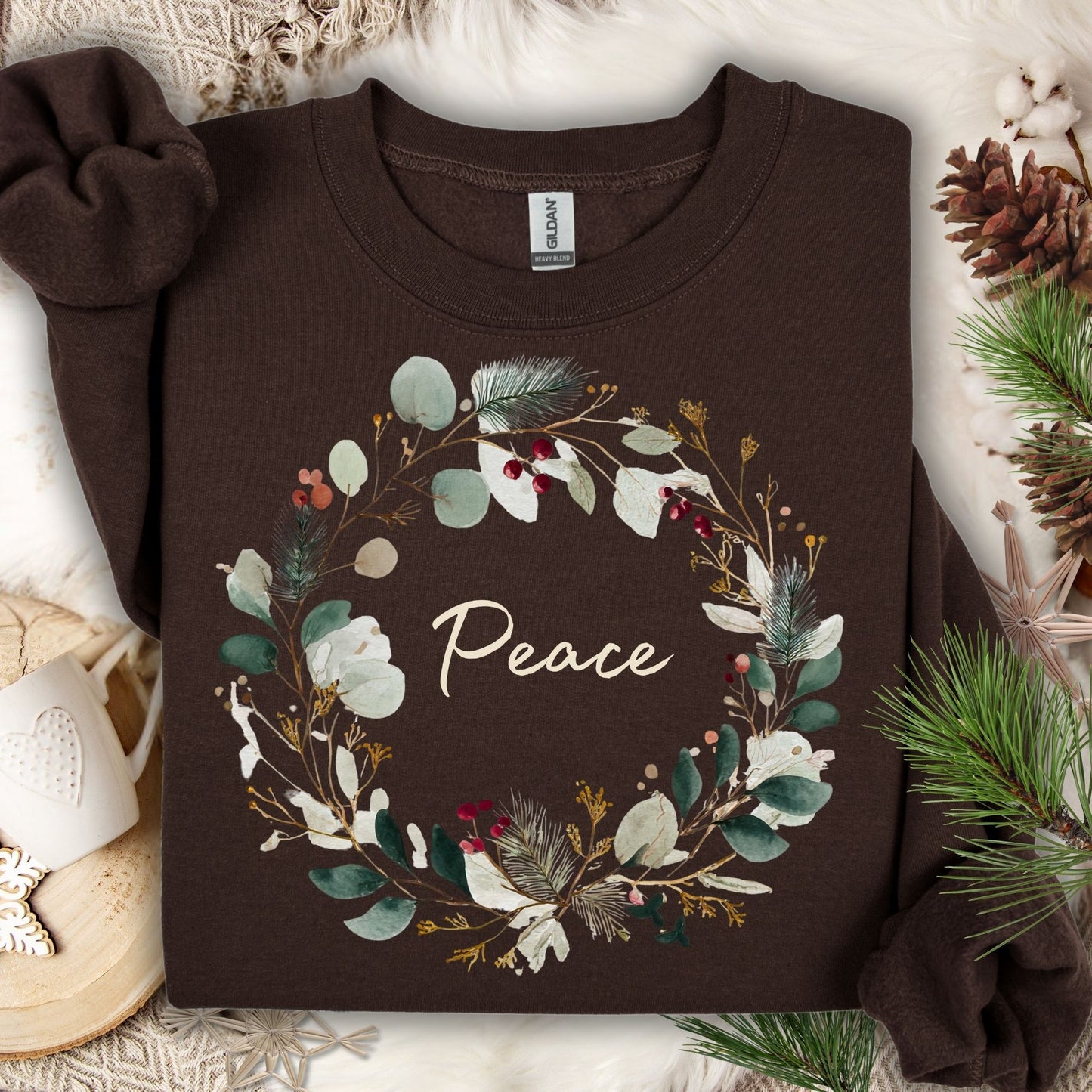 Dark Chocolate Peace Christmas Wreath Sweatshirt with watercolor wreath and red berries.