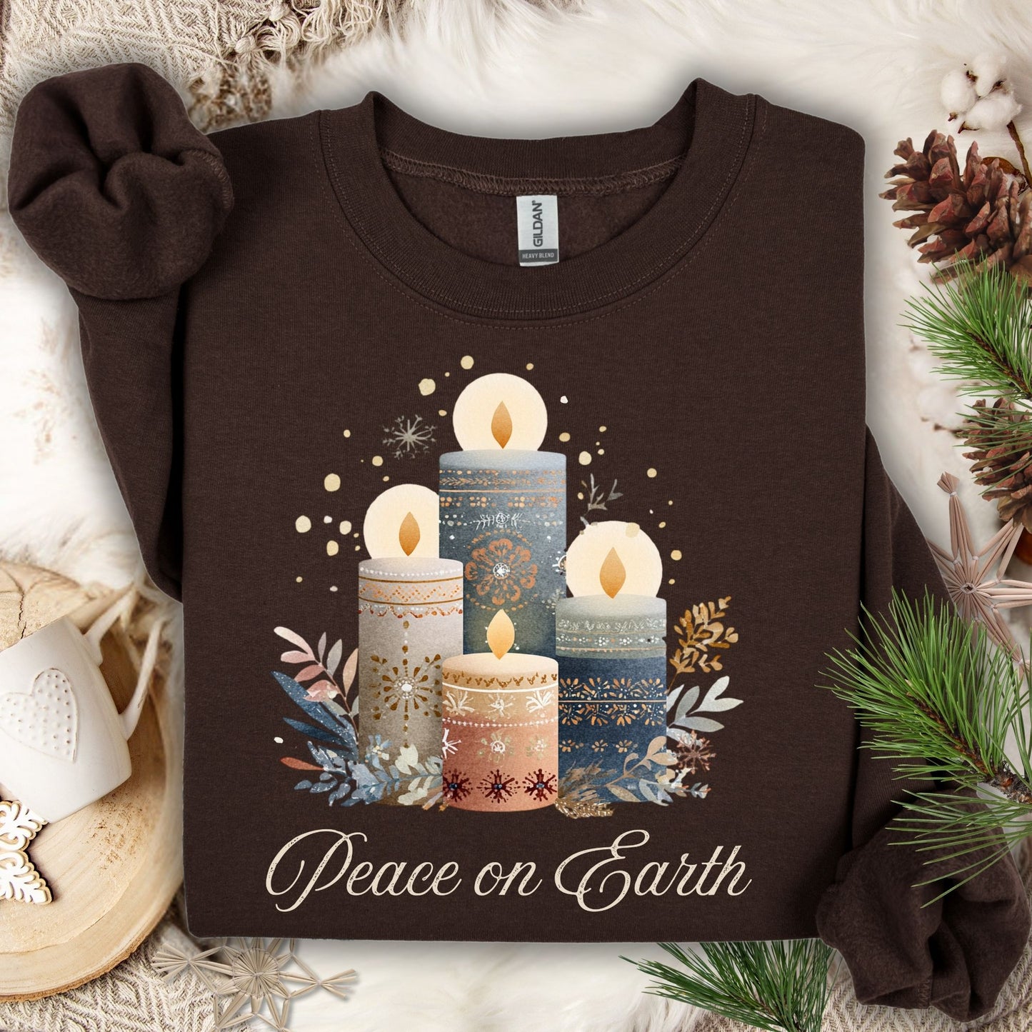 Dark chocolate Gildan sweatshirt with "Peace on Earth" and Nordic advent candles in sage, blue, taupe.
