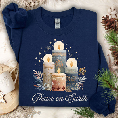 Navy Gildan sweatshirt with Nordic advent candles, winter foliage, and "Peace on Earth" in muted tones.