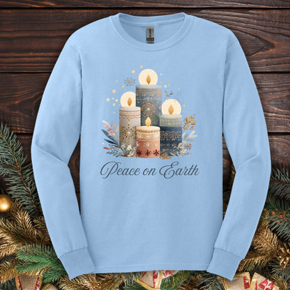 Light blue Gildan long sleeve tee with folk art Nordic advent candles and "Peace on Earth" text.