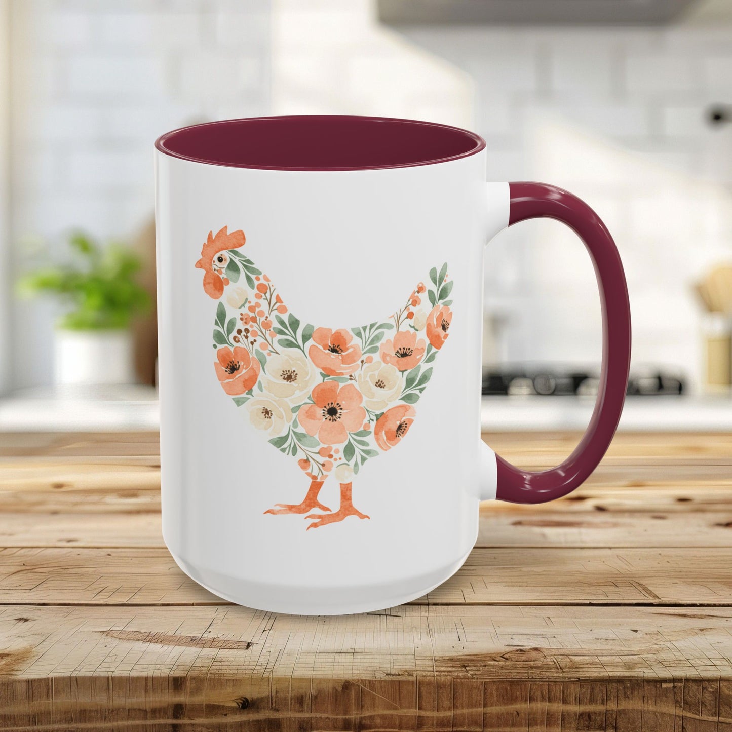 15oz white ceramic mug with maroon handle/interior and a coral/sage floral chicken design.