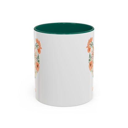 White ceramic mug with a green interior and handle, featuring a coral and sage floral chicken silhouette.