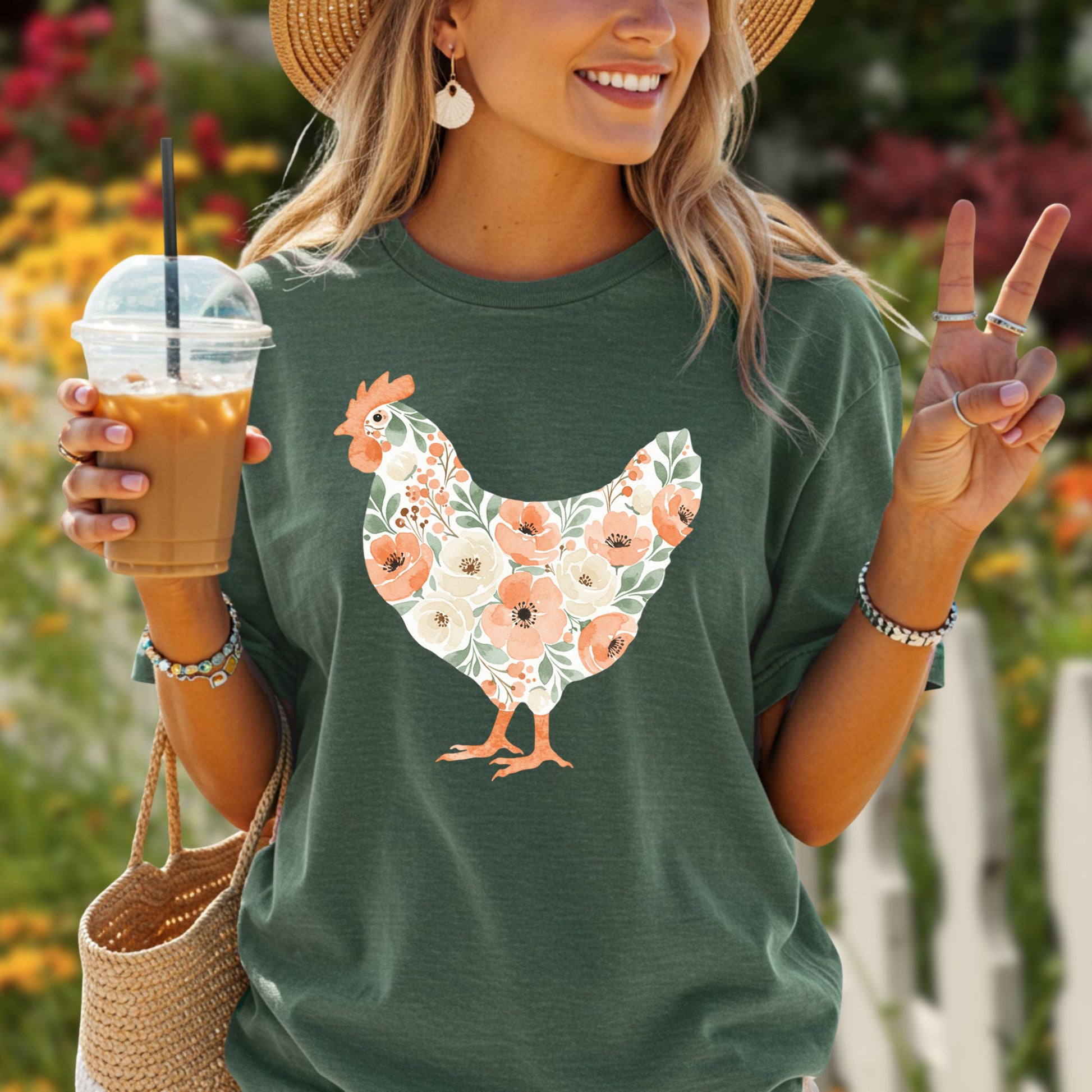 Relaxed-fit, garment-dyed green t-shirt with a watercolor floral hen design.