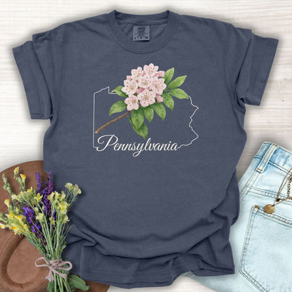 Denim S t-shirt with pink mountain laurel over a Pennsylvania outline.