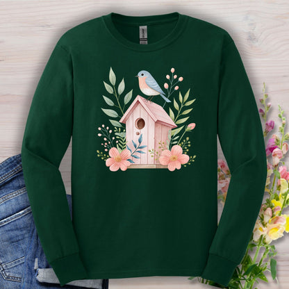 Forest Green long sleeve tee with a pink birdhouse, blue bird, and floral watercolor design.