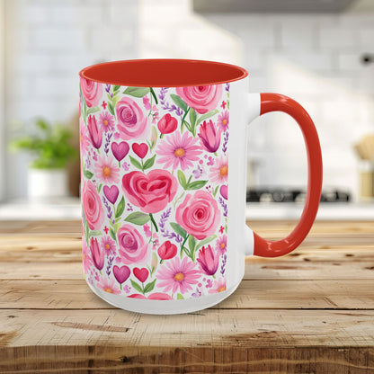 15oz white ceramic mug with a red handle and interior, featuring a watercolor pattern of pink roses, tulips, daisies, and hearts.