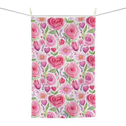 Pink rose, tulip, and heart watercolor microfiber kitchen towel, 16"x25", hanging on a clothesline.