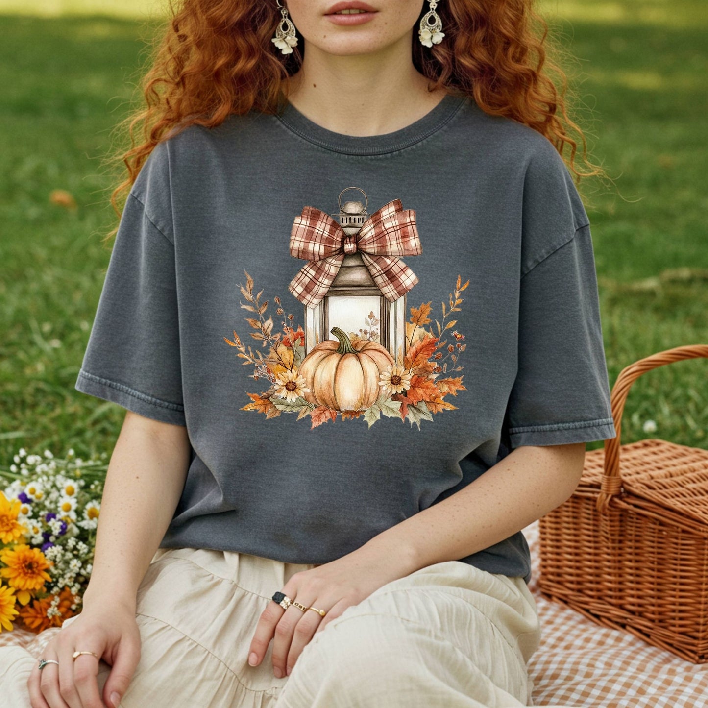 Garment-dyed charcoal tee with a rustic lantern, pumpkin, sunflowers, and plaid bow design.