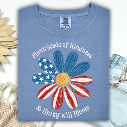 Blue Jean t-shirt with "Plant Seeds of Kindness & Unity will Bloom" and a watercolor American flag daisy.