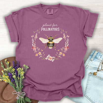 Berry S, garment-dyed cotton t-shirt with a hand-painted bumblebee and "Plant for Pollinators" text.