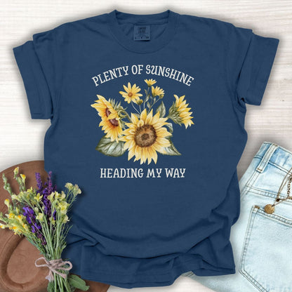 True Navy garment-dyed t-shirt with "Plenty of Sunshine Heading My Way" and sunflower graphic.