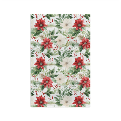 Microfiber tea towel with a vibrant watercolor poinsettia, cream bloom, and berry holiday pattern.