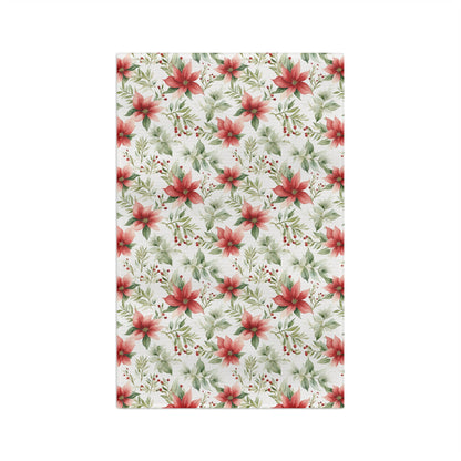 Watercolor poinsettia microfiber tea towel with red flowers, green leaves, and berries.